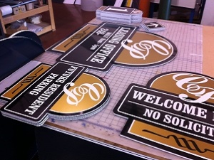 Royal Oak signs, way signs, being printed for a business