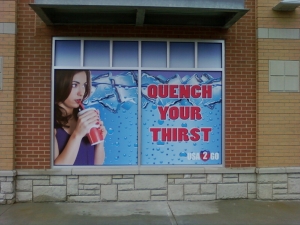 Sign on a window of a building exterior in Royal Oak, Michigan