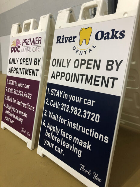 Signs in Birmingham, MI, used as sidewalk signs with instructions for appointments only