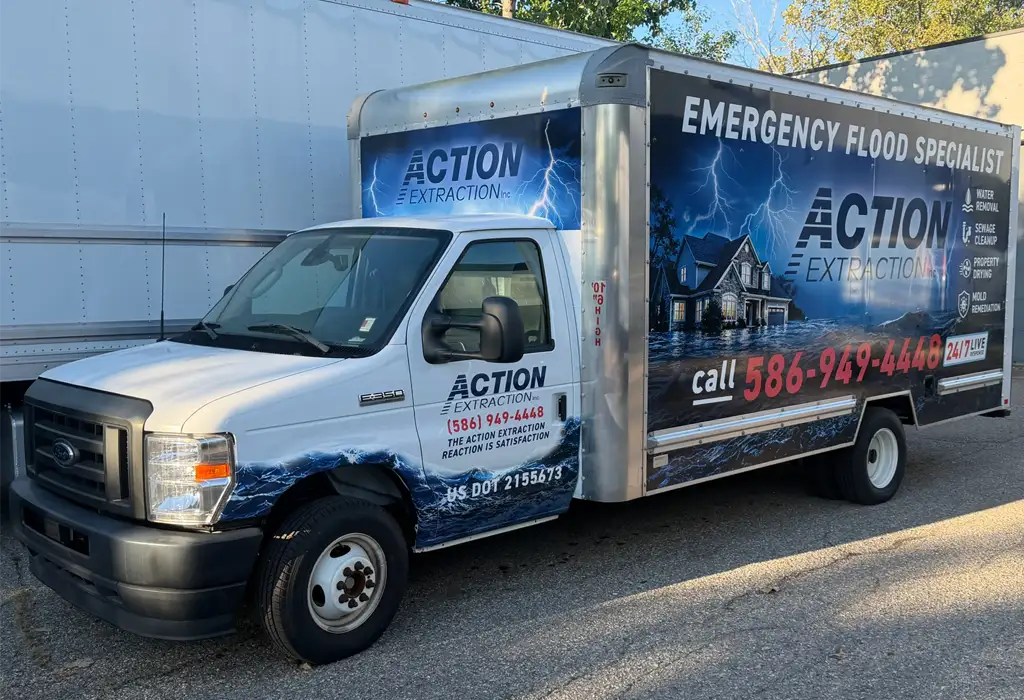 vehicle-wraps-ann-arbor An Action Extraction vehicle that has an example of vehicle wraps on it Ann Arbor